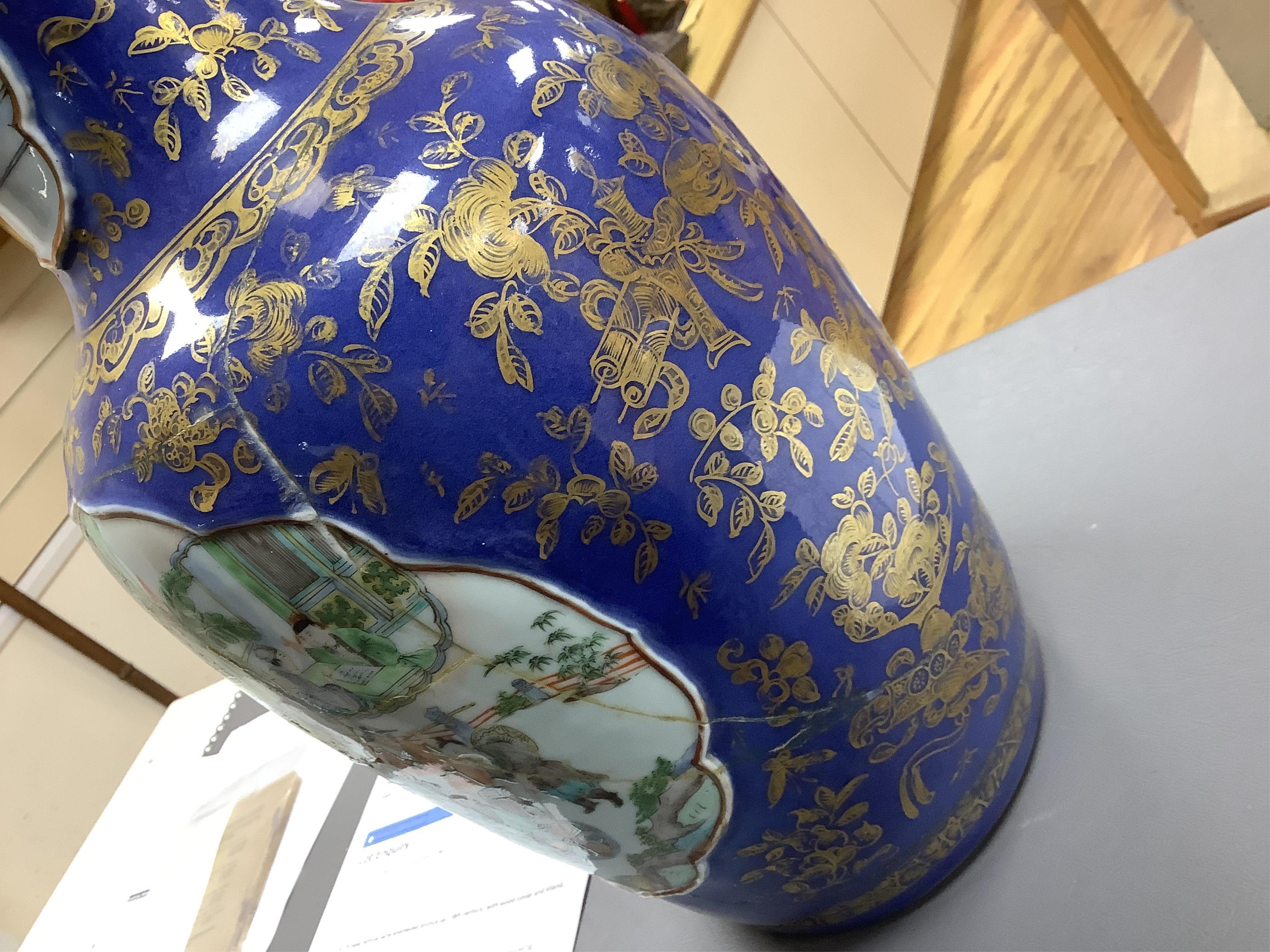 Three early 18th century Chinese Imari dishes (one clobbered), largest 46.5cm, together with a 19th century Chinese powder blue ground vase, 44cm high and a horn carving, 13.7cm (5)